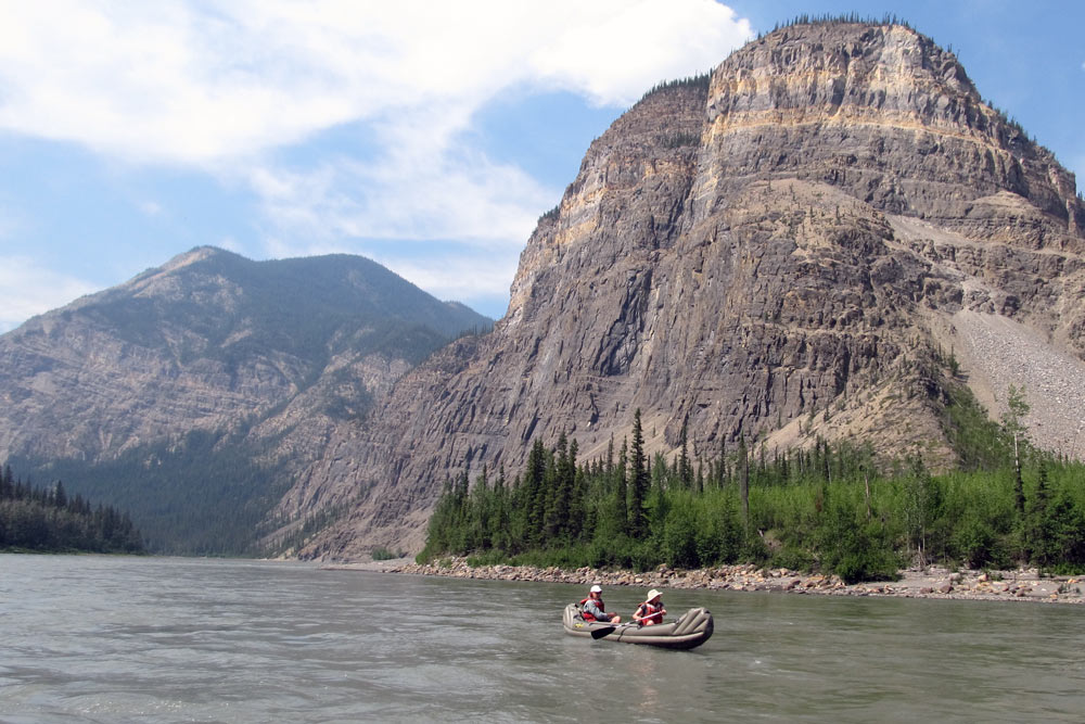 Canoeing through Canada's deepest canyons on the Nahanni River in Nahanni National Park Preserve.