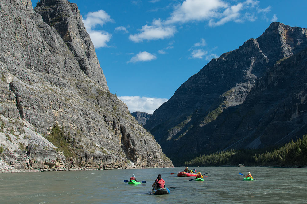 Canoeing through Canada's deepest canyons on the Nahanni River in Nahanni National Park Preserve.