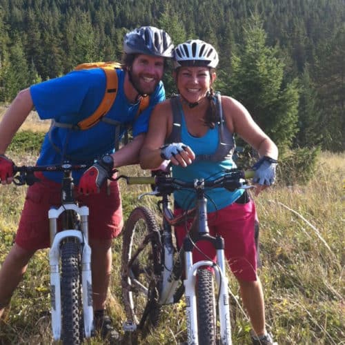 a man and woman on bikes