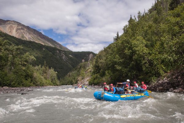 Rafting through rapids on the Tatshenshini River, which flows through the Yukon, British Columbia, Alaska, Glacier Bay National Park, Alsek/Tatshenshini Provincial Park, out to the Gulf of Alaska.