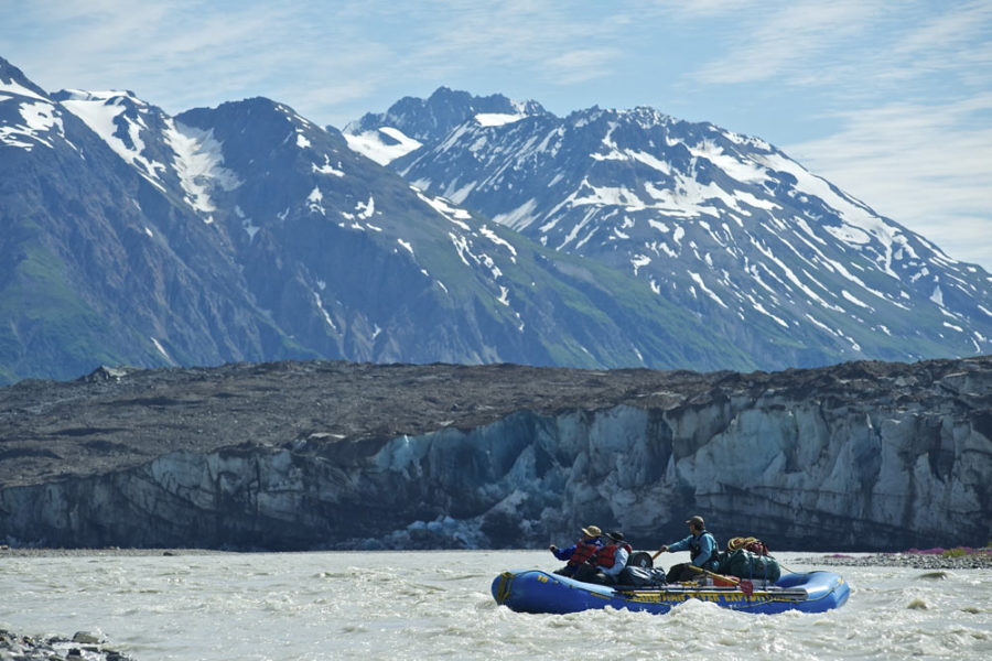 Rafting past Tweedsmuir Glacier in Tatshenshini Alsek Provincial Park, British Columbia.