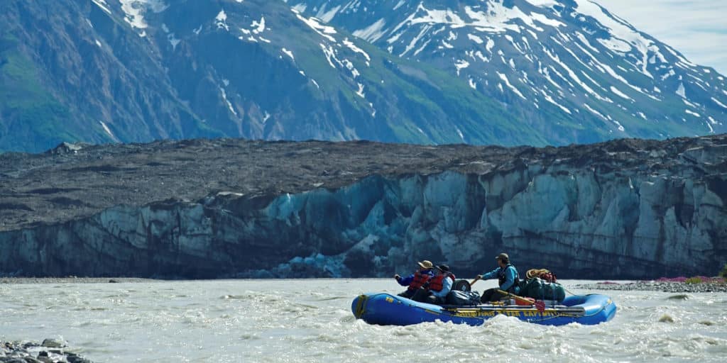 a group of people in a raft