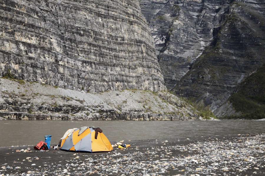Camping on the shores of the Nahanni River in Nahanni National Park in Canada's Northwest Territories.
