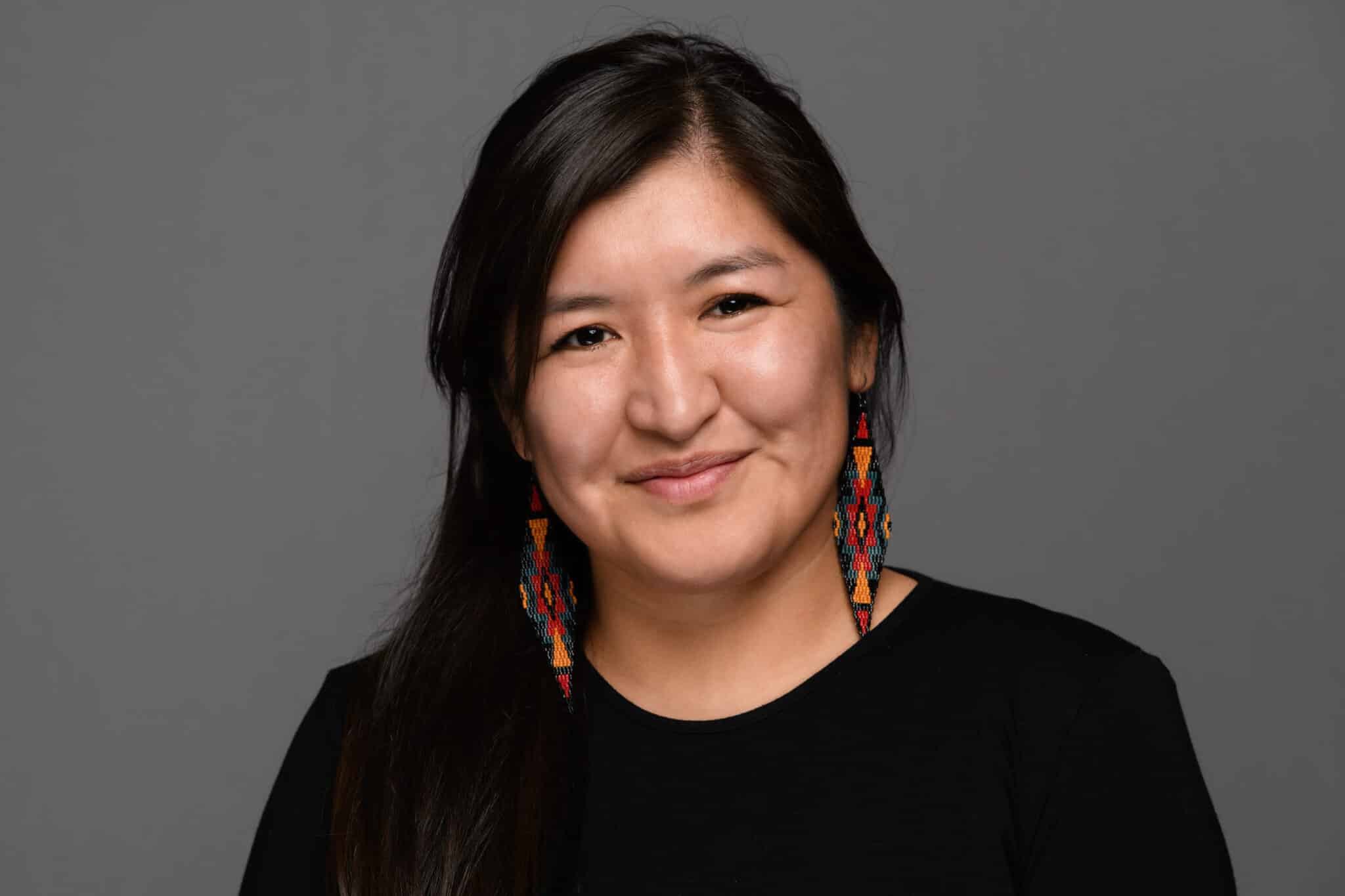 a woman smiling for a picture