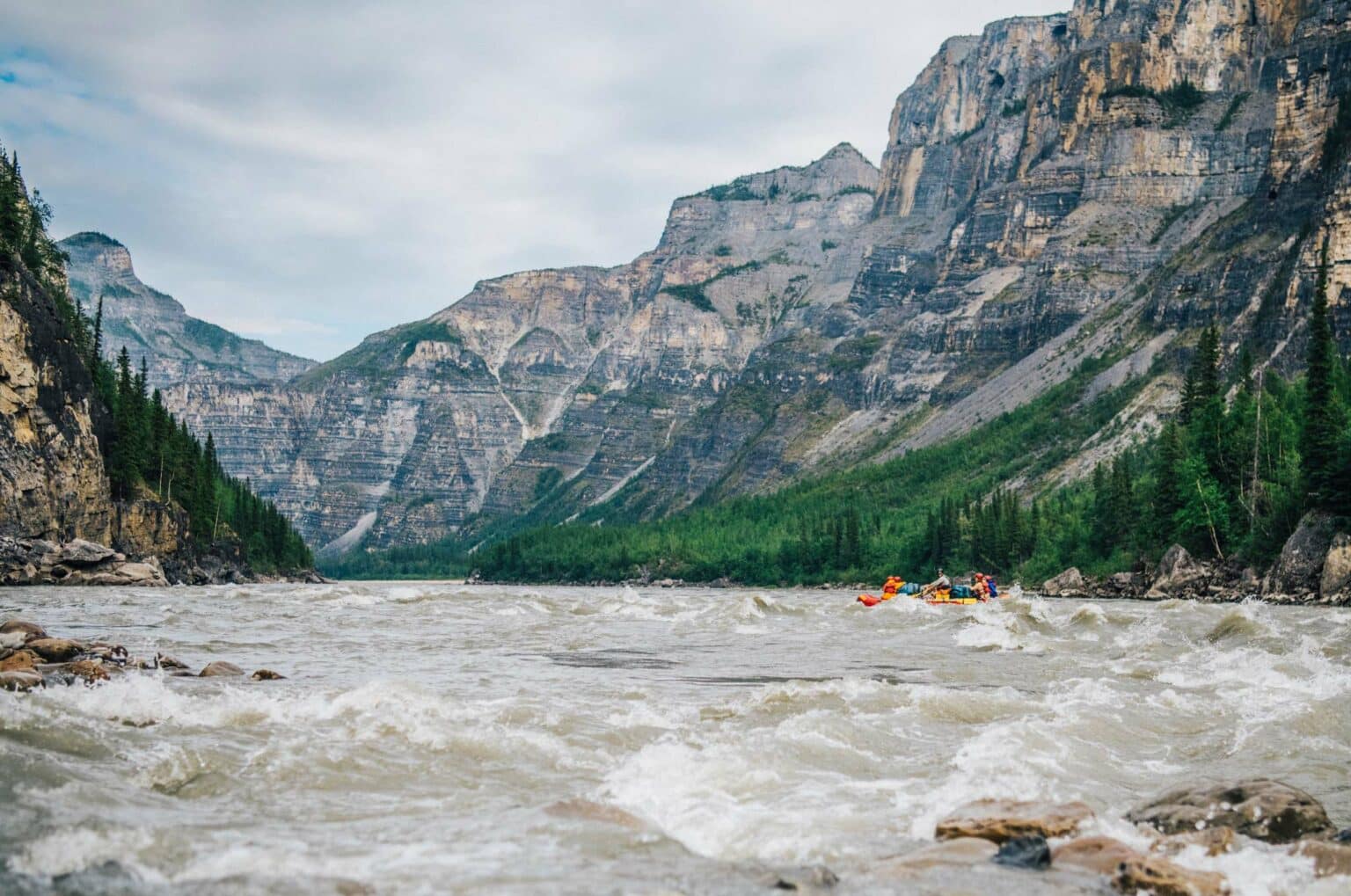 a river with rafts in the water