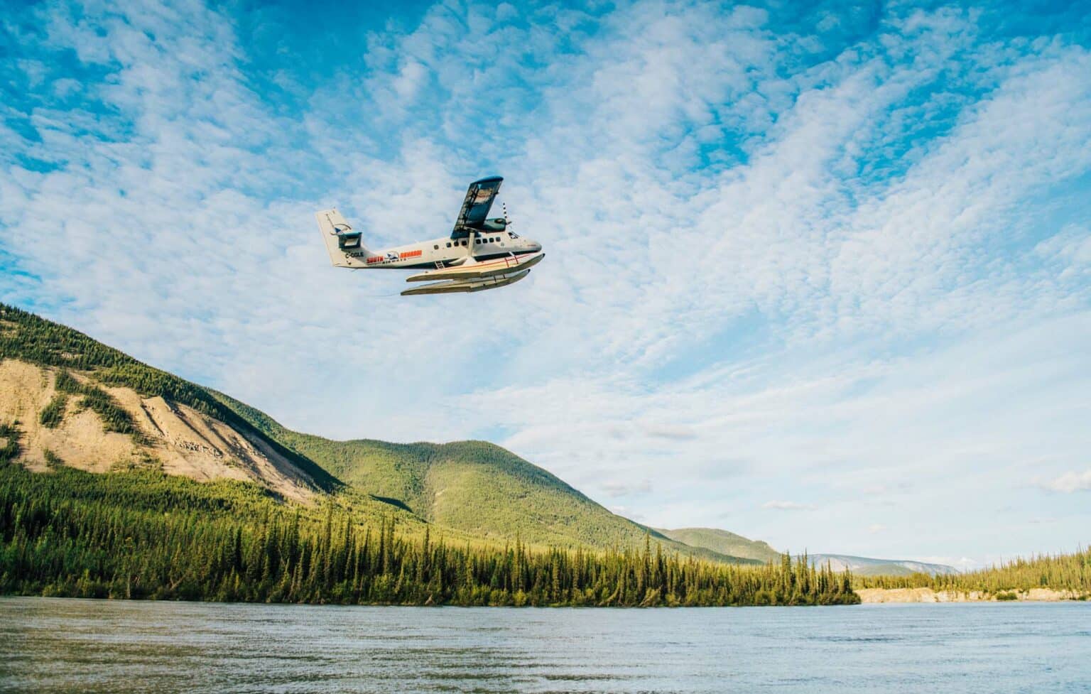 a plane flying over water