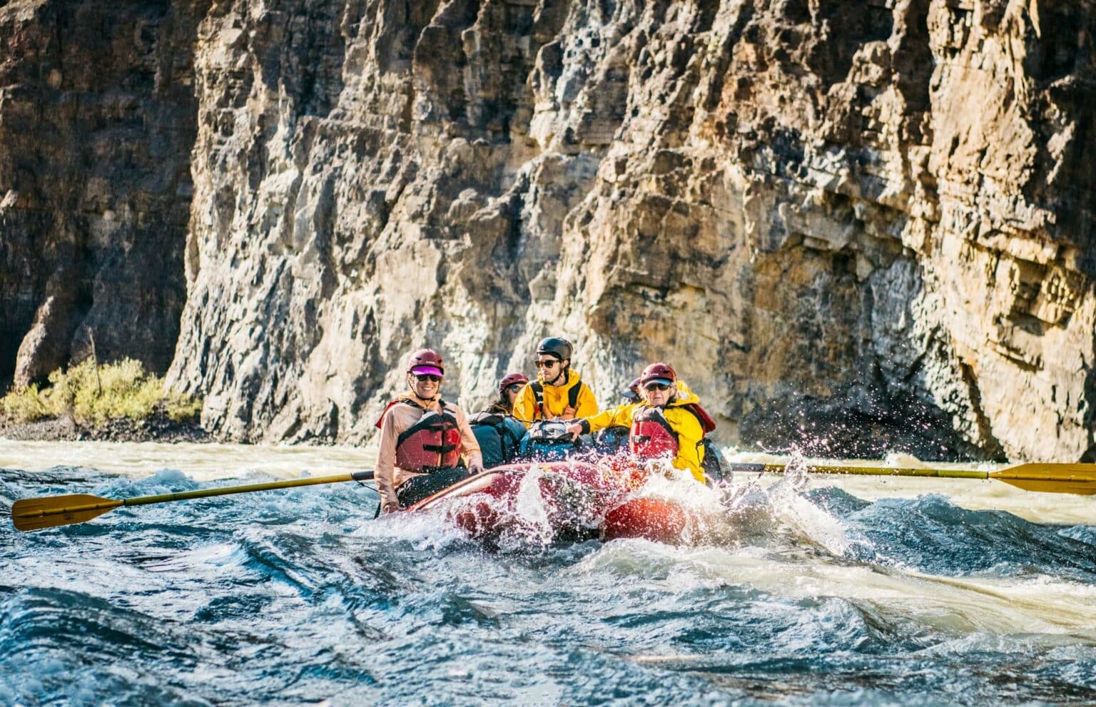 a group of people in a raft