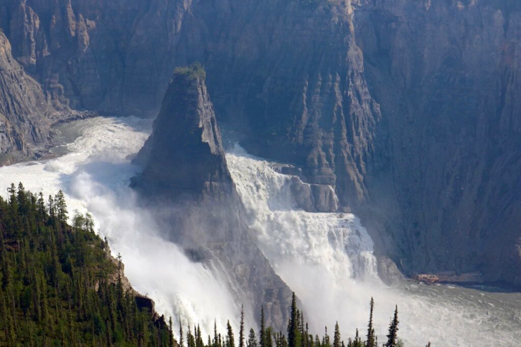 a waterfall in the mountains