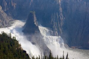 a waterfall in the mountains
