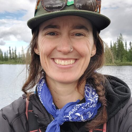 a woman smiling for a selfie