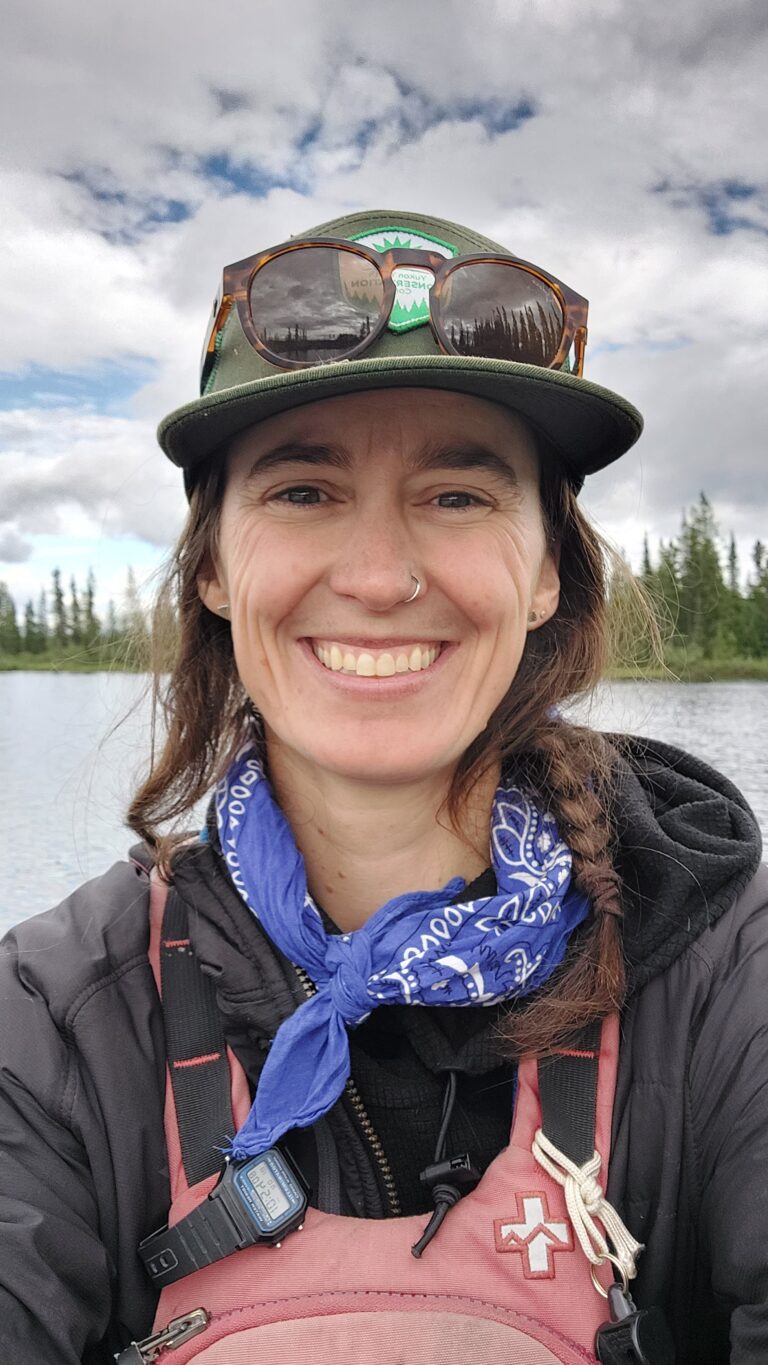 a woman smiling for a selfie