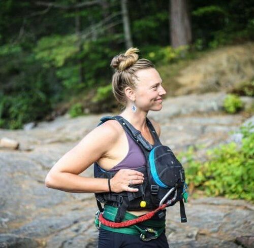a woman wearing a harness