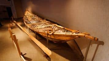 a wooden boat on display