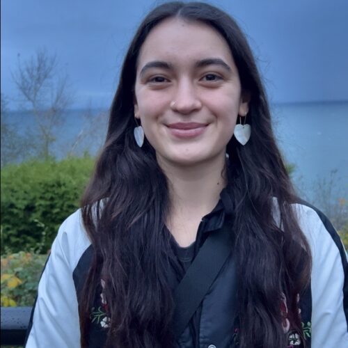 a woman smiling at the camera
