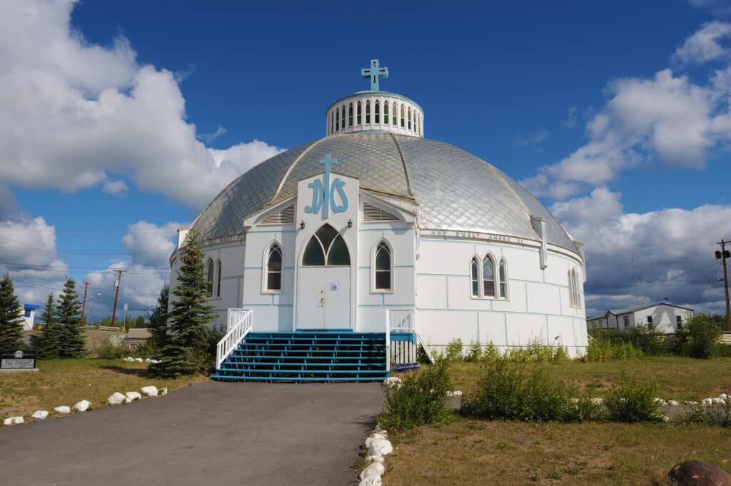 a white building with a dome roof