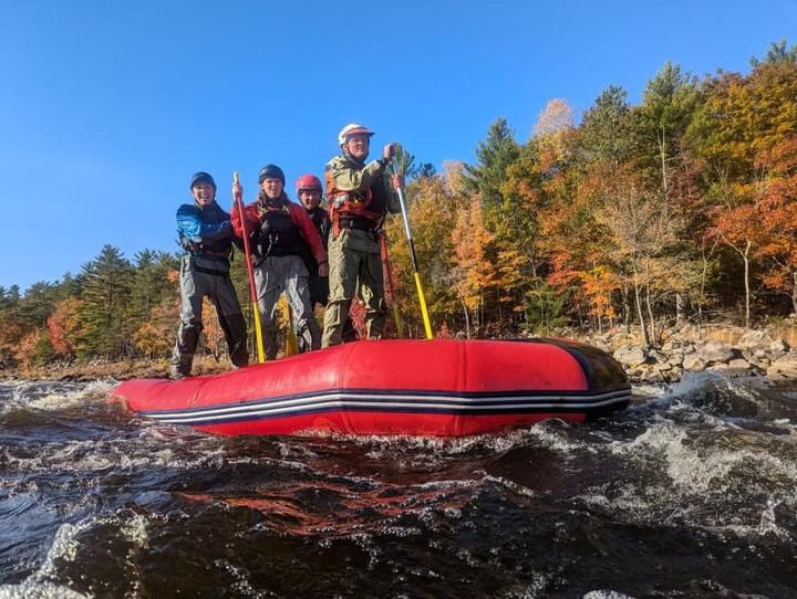 Standing up on a flipped raft
