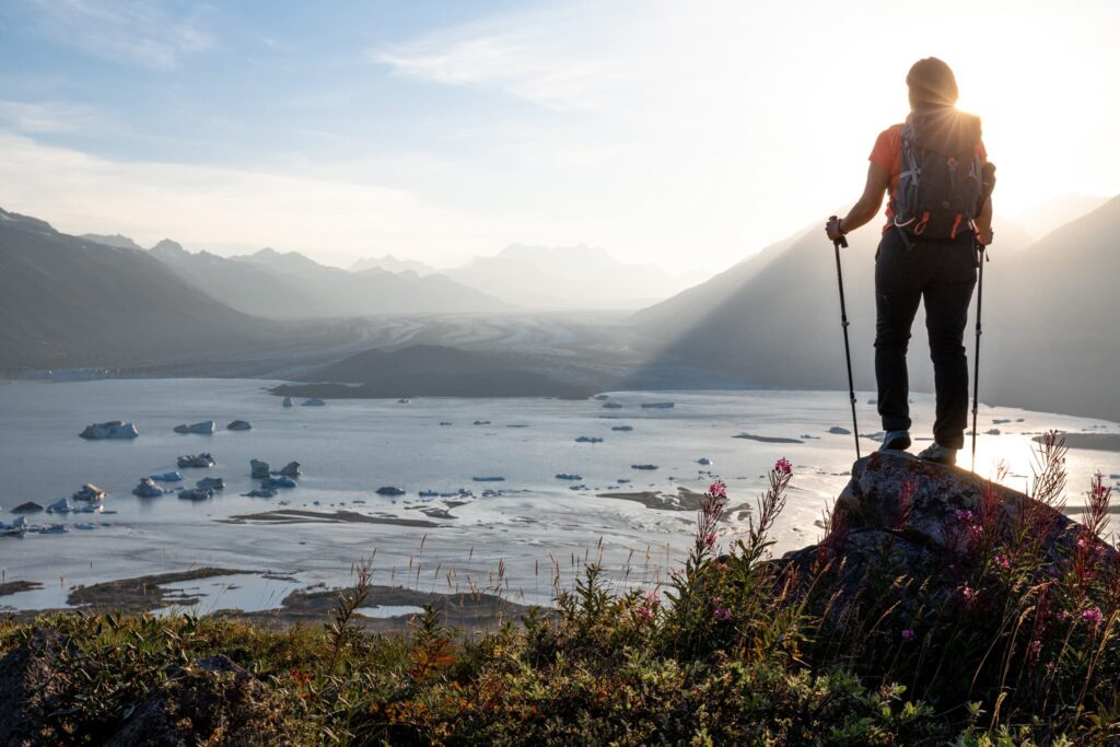 Hiker overlooking Alsek Glacier