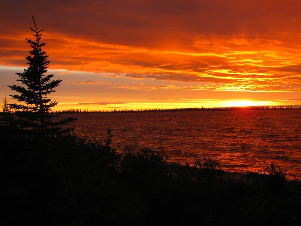 Vibrant sunset over calm water