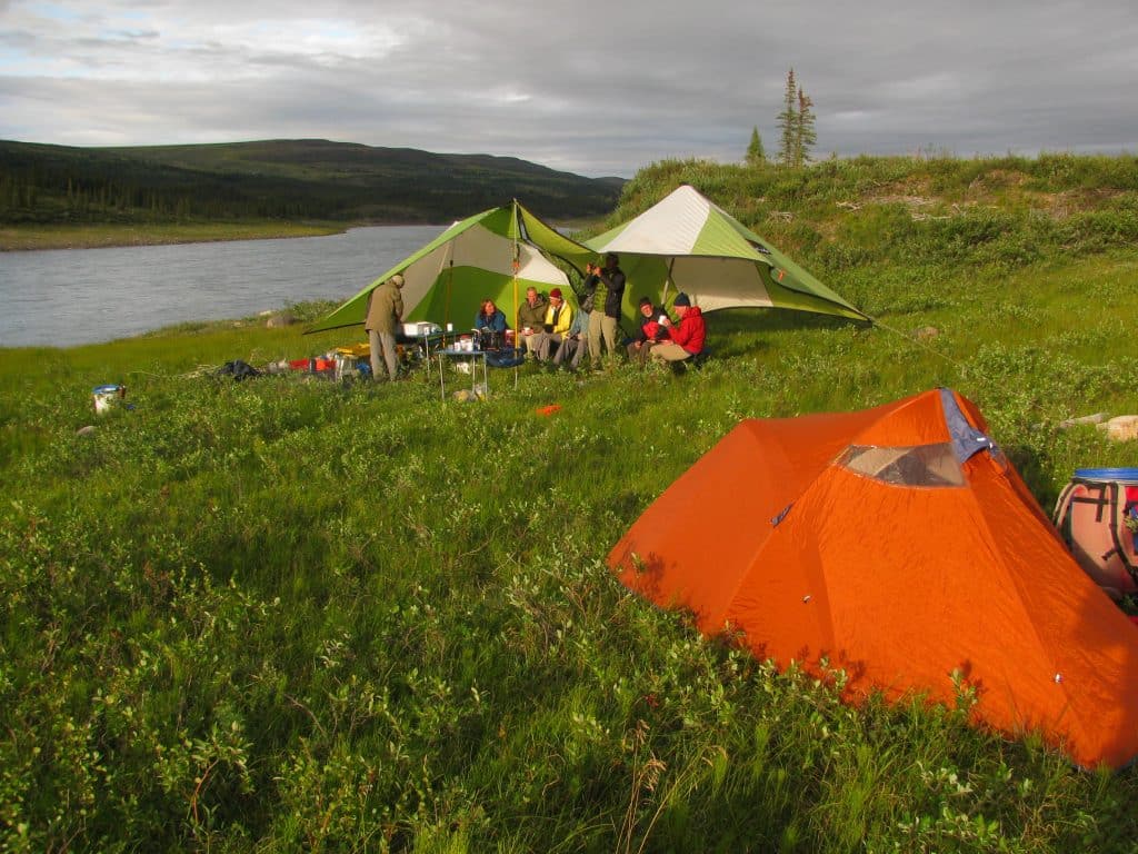 Campsite by river in wilderness