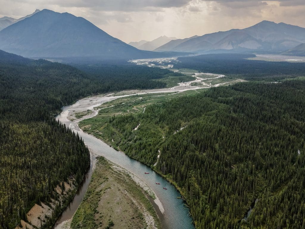 Winding river through lush green landscape
