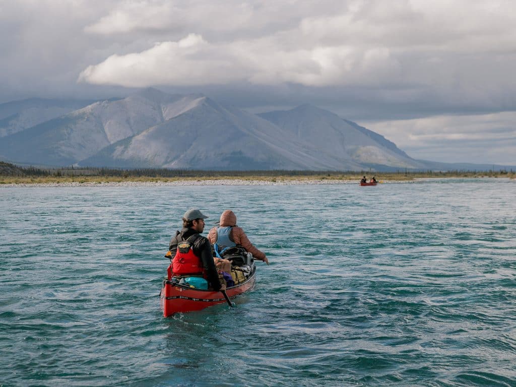 Canoeing on a serene mountain lake