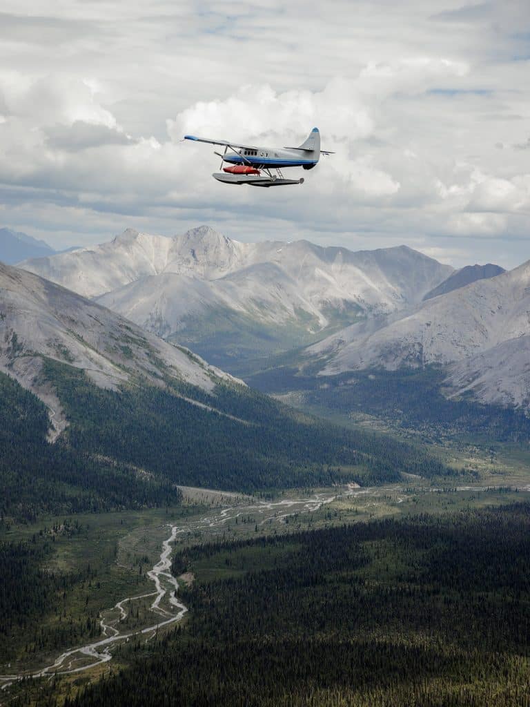 Plane flying over mountainous landscape