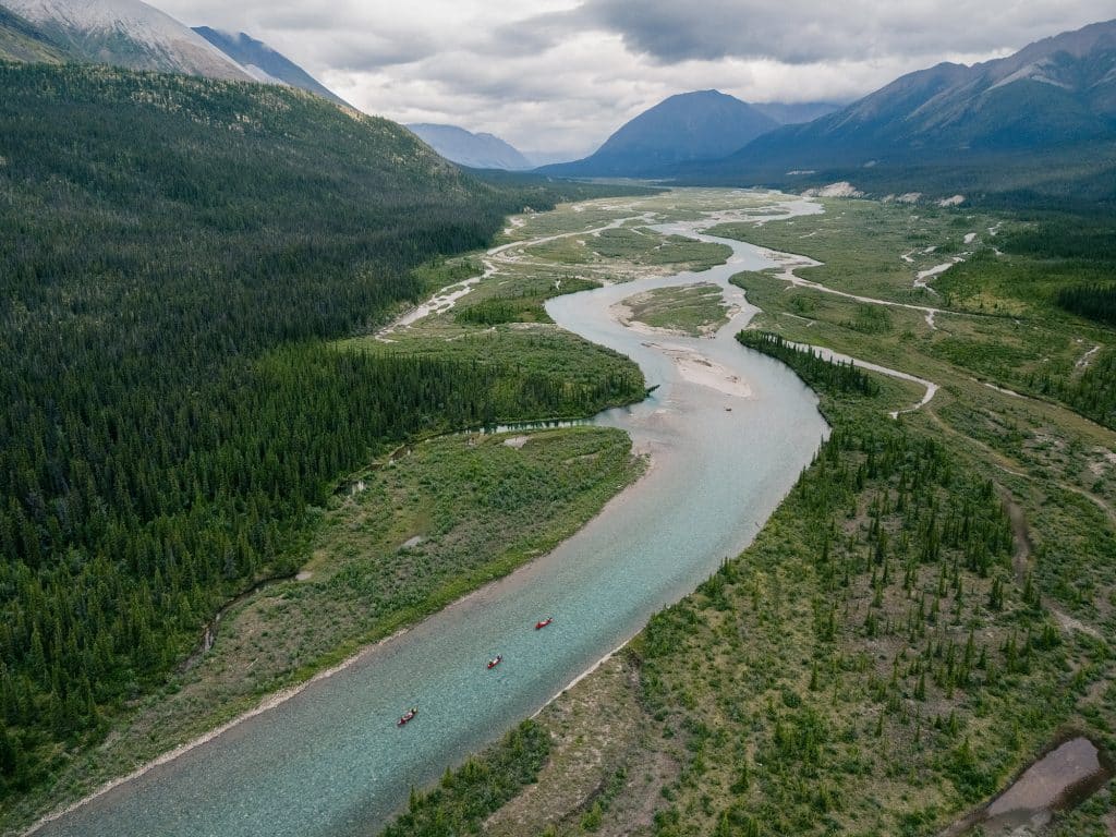 Winding river through lush green landscape